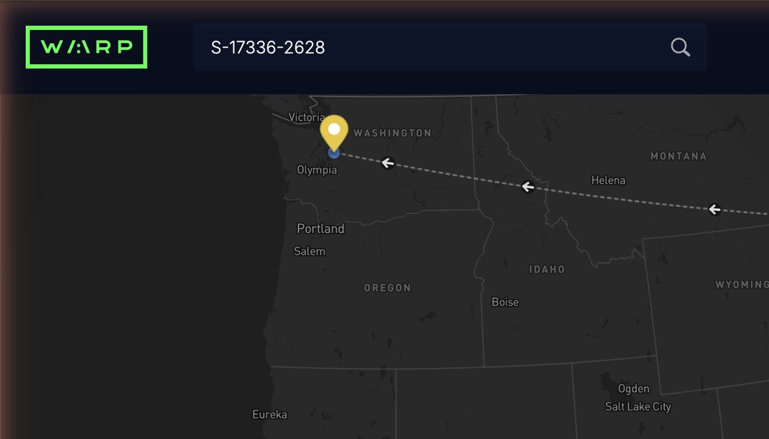 Warp live tracking: a shipment en route with its truck pin on the map